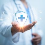 A,Medical,Worker,Holding,Of,Health,Care,Icons,,Medical,Technology